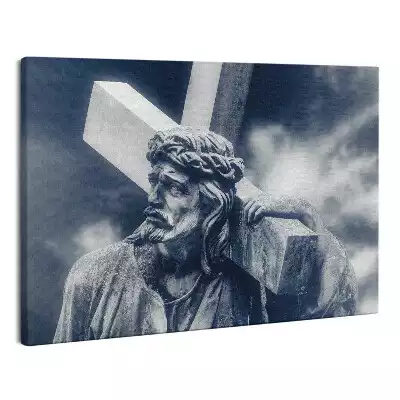 Obraz na płótnie abstrakcja Kamienna rzeźba Jezusa z krzyżem i niebo